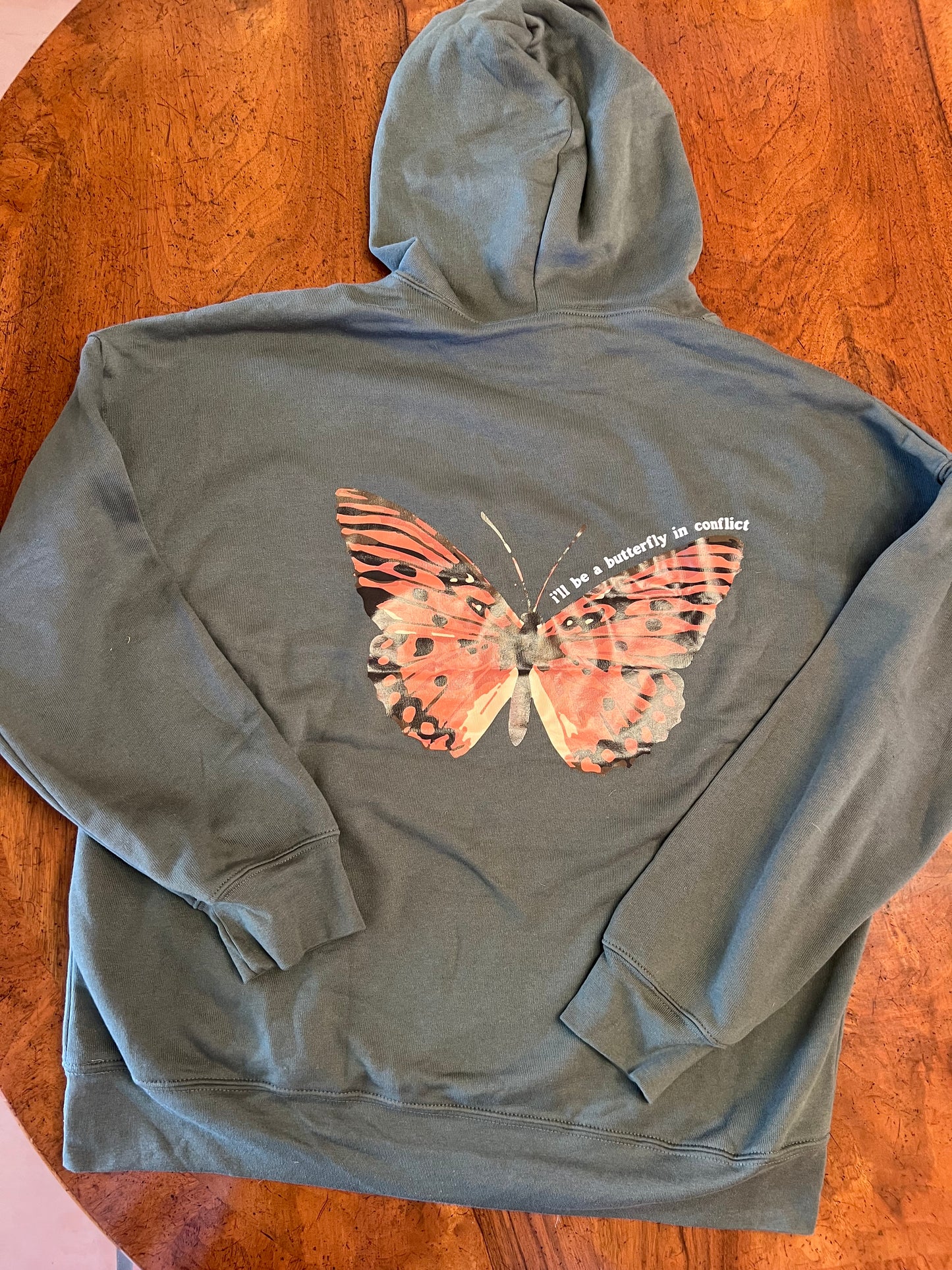 Butterfly in Conflict Hoodie